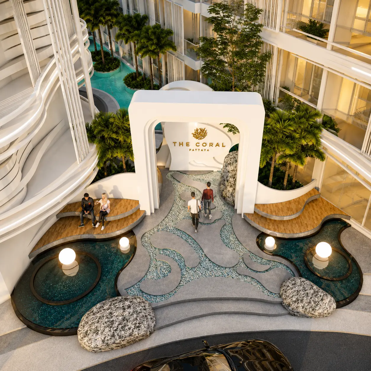 Landscaped arrival courtyard with water features at The Coral Pattaya