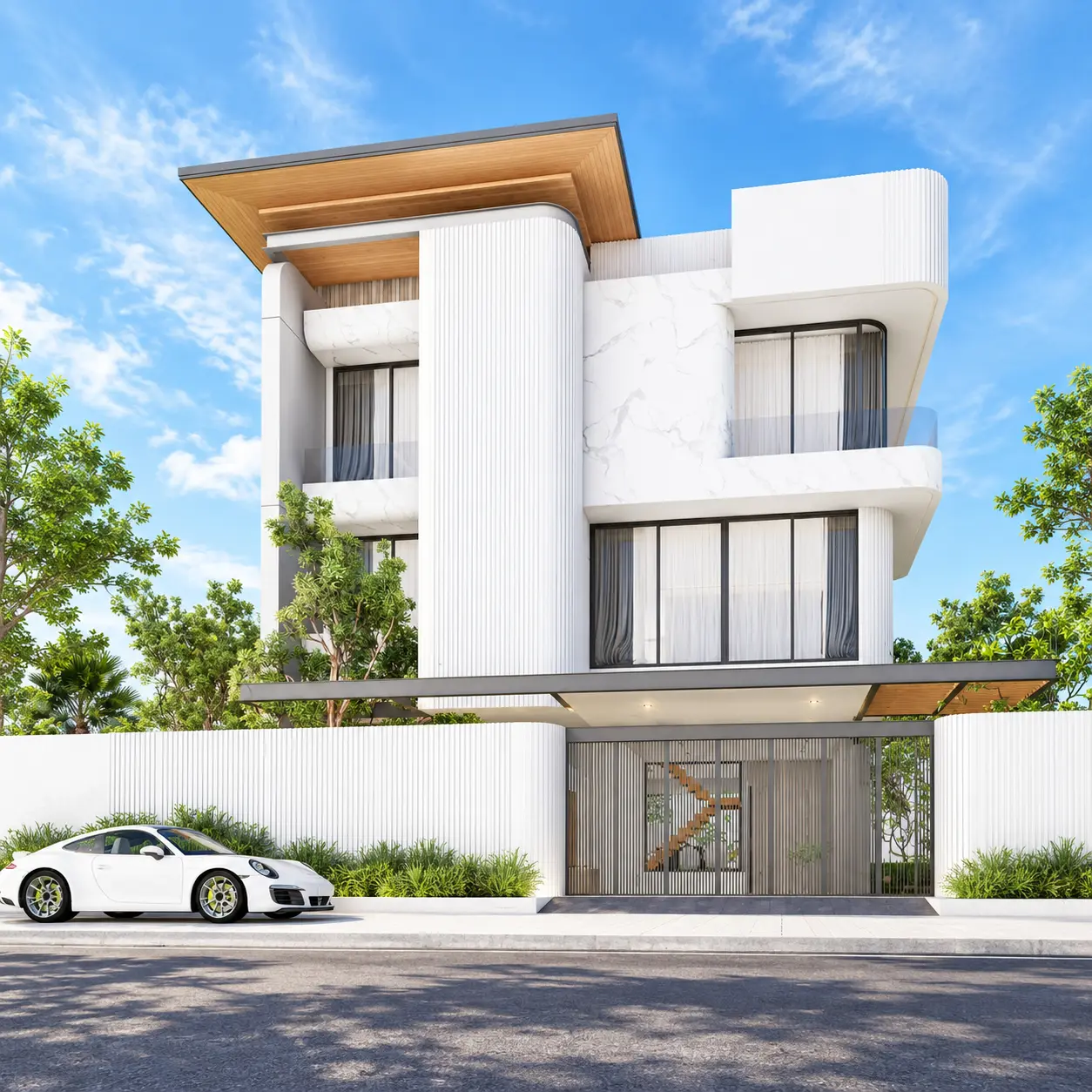 Three-storey white villa facade with covered entrance at ALLTHAI Villages