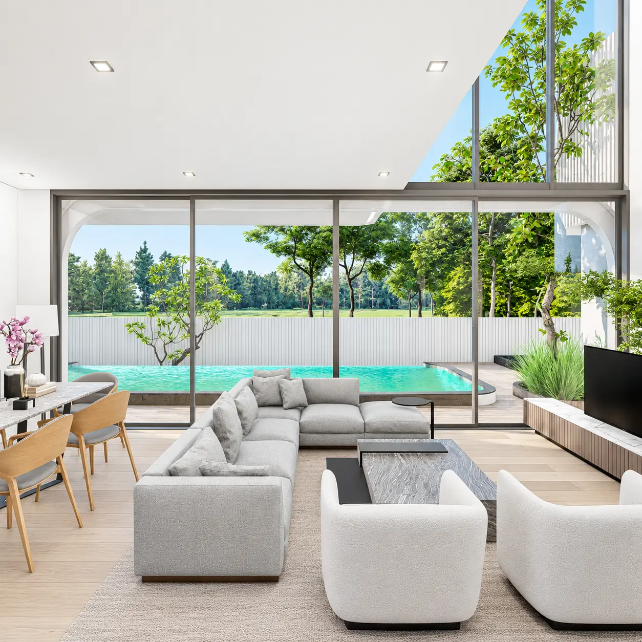 Open-plan living room overlooking a private pool and garden at ALLTHAI Villages